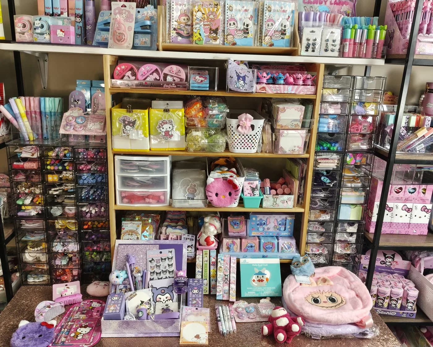 Shelves and a table organized with colorful party prizes